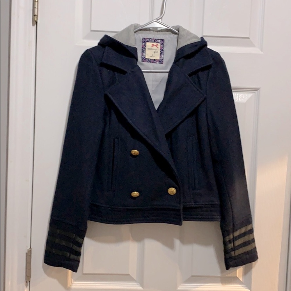 Short dark blue jacket.